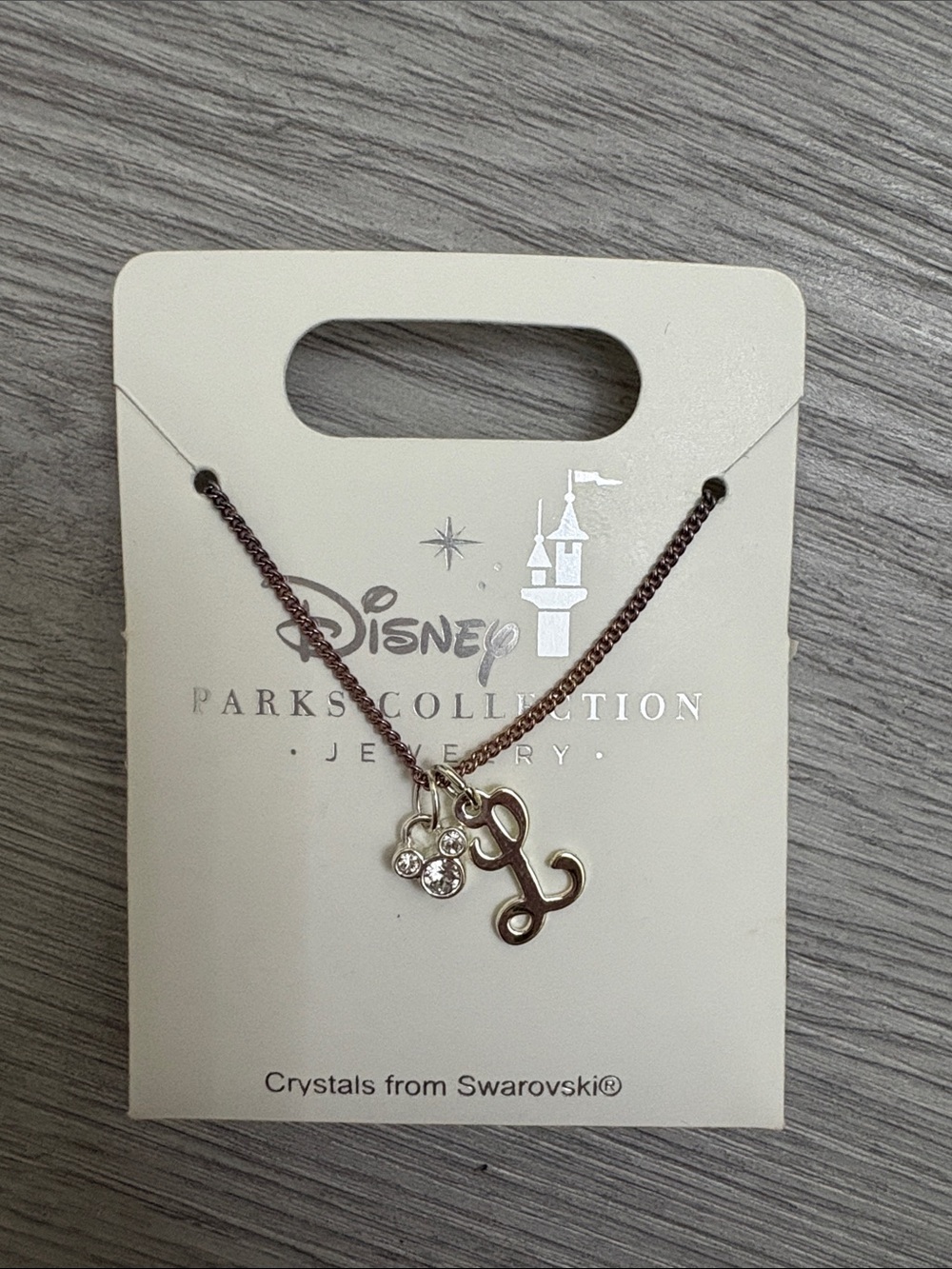 NWT Disney Silver Initial L Necklace with Crystal Paw Charm